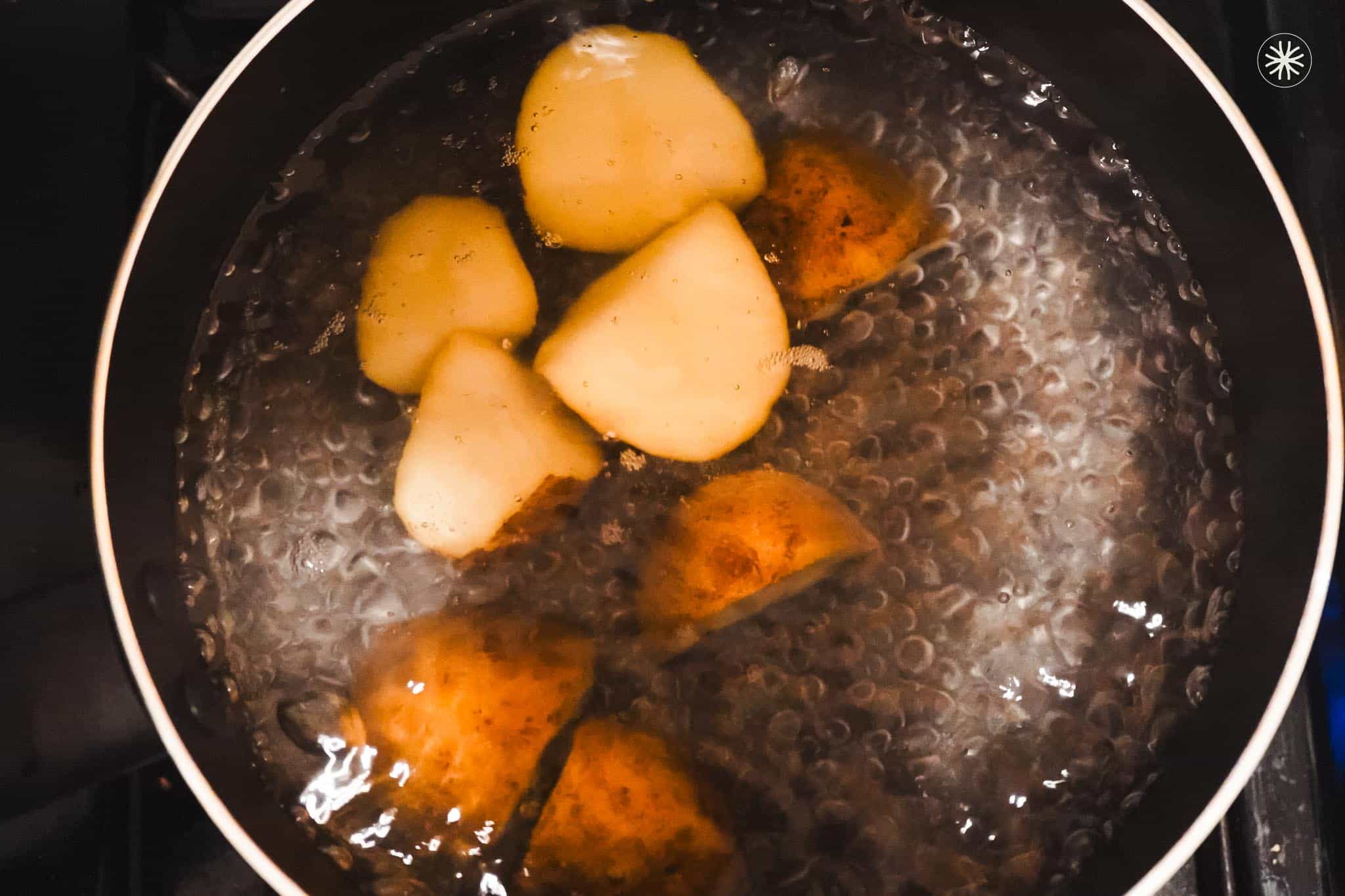 Boiling potato slices